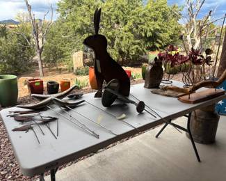 Outdoor Coyote, Bunny, Swimming Koi, Flowers and artifacts