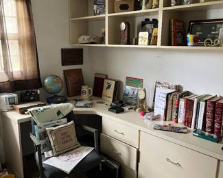 Office with books, golf decor, horse decor and more