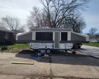 This camper is a 2012 Forest River Rockwood Freedom pop-up camper (2560G). This unit comes equipped with an indoor toilet and standup shower. The camper comes with all of the accessories pictured, which includes outside stovetop burners, cookware, cups, plates, silverware, and fresh water hoses. The camper is equipped with an electric lift to raise and lower the roof. Includes a spare tire, the tires are 2 years old with minimum wear. The roof has been repaired but there are no leaks. The camper is dry and air tight. This camper can sleep 6 people easily with one slide out being a queen and the other being a king. The dinette converts to another bed.