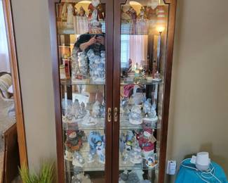 Wooden curio cabinet with light - contents not included. 76" x 33.5" x 12"
