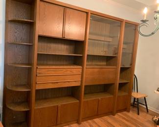 #27 4 pc German Shrunk Lighted 7 wood doors, 2 glass doors, 3 drawers 108" long x 17" deep x 88" tall YOU MOVE $100.00