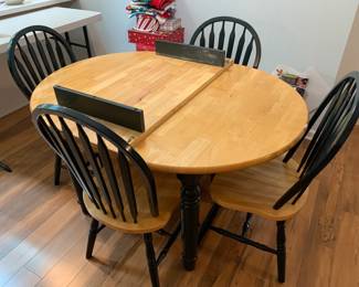 #24 Kitchen table w one leaf and 4 chairs painted dark green 54-72x42x30" $125.00
