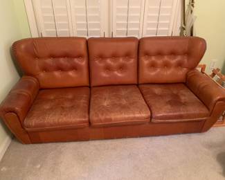 #2 Brown leather sofa seat height 13" x 77" long. Leather as is $100.00