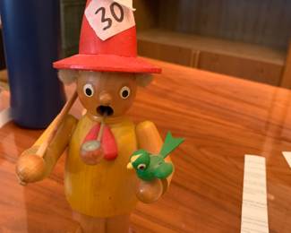 #86 german inscent burner of man with bird 9 in tall $30.00