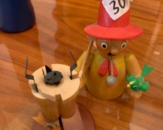 #86 german inscent burner of man with bird 9 in tall $30.00