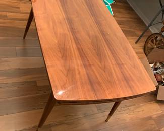 #30 Teak wood table adjustable height w built in extentions 46-72 L x 26 w x 25-29" H $125.00