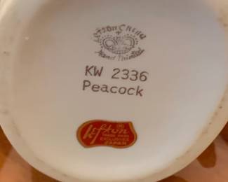 #89 Lefton pecock statue 7 inch tall $25.00