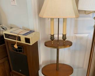 #22 Brass floor lamp w 2 built in tables and 2 candle shaped lights 55" tall $75.00