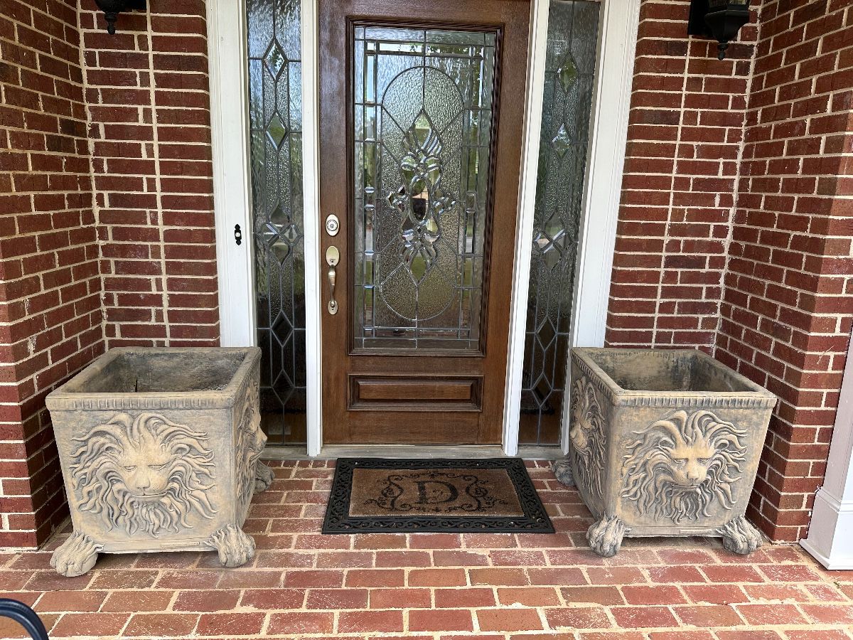 Large cement lion planters