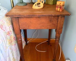 Vintage side table measuring 19”deep, 19.75”wide and 27.5” tall.