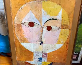framed print of Senecio (also known as Head of a Man Going Senile), a famous 1922 Cubist oil painting by Swiss-German artist Paul Klee. 