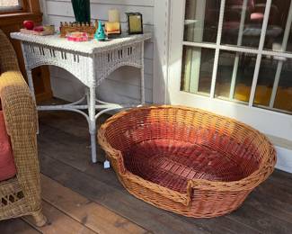 Extra large wicker dog bed and white wicker side table