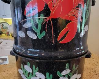 In the Midwest we have our speckled enamel "hotdish" pan...on the East Coast they have their speckled enamel lobster pot!