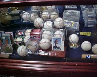 Hundreds of Autographed Baseballs.