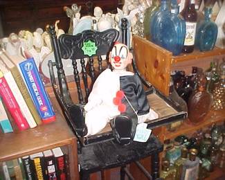 High Chair, Clown, Decanters, Liquor Bottles, Books, and stuff.