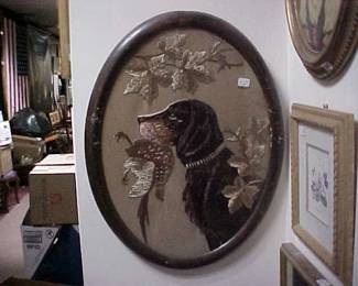 Antique Dog and Pheasant silk thread needlepoint artwork in an oval wooden frame.