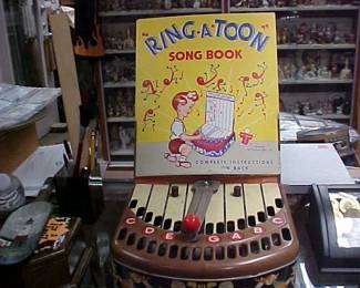 Ring-a-toon vintage toy and song book.