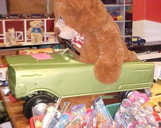 Vintage pedal cars and thousands of toys in our toy room.