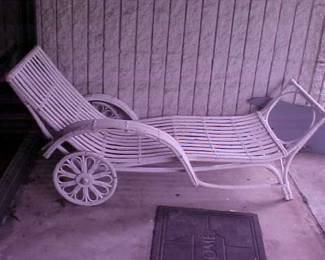 Wicker outdoor lounge chair.