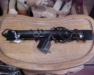 Here it is.  For everyone who has gone crazy over uranium glass, cadmium glass, or anything else that glows under a black light, here is the black light to display your items.