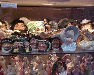 Royal Doulton Toby mugs and a few head vases.