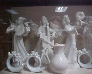 Dresden Angels and white ceramic pieces.