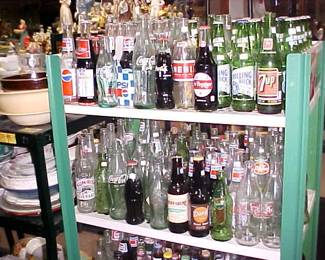 Vintage soda and beer bottles.
