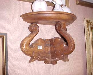 Elephant wooden shelf.