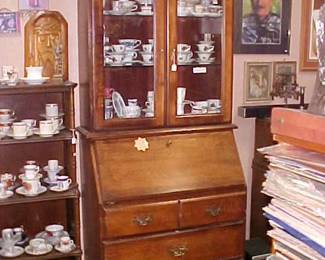 Drop down desk cabinet drawers.
