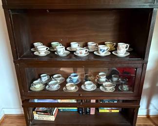 Assorted Vintage Teacups and Saucers in Barrister Bookcase