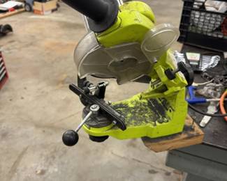 Chainsaw grinder with the expensive Diamond Wheel.  Have another brand grinder as well that was used for rakers.