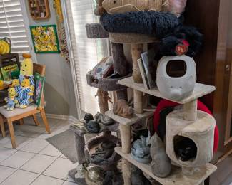 Multi-Level Cat Tree with Various Cat Figurines and Plush Toys