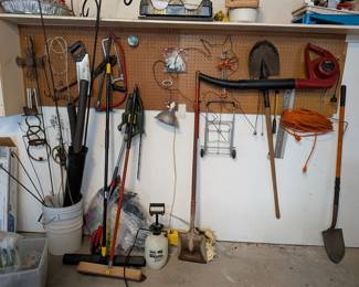 Assorted Garden Tools and Hardware with Storage Solutions