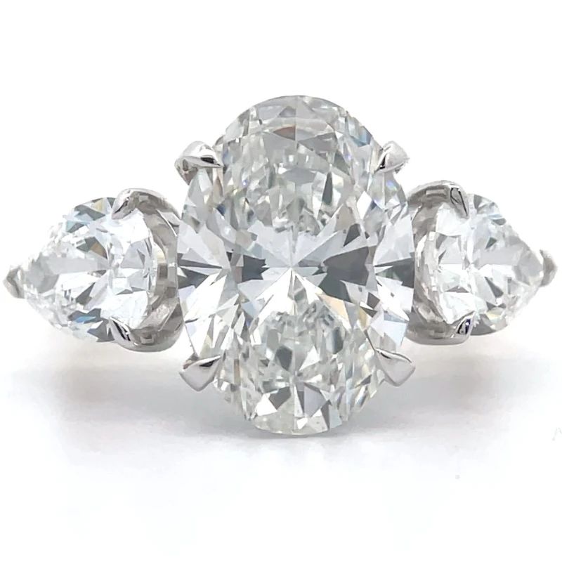 8.95 Carat Diamond Oval & Pear Three-Stone Ring in 14k Yellow Gold