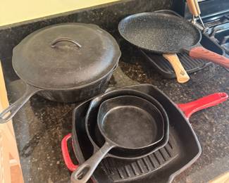 collection of cast iron kitchenware