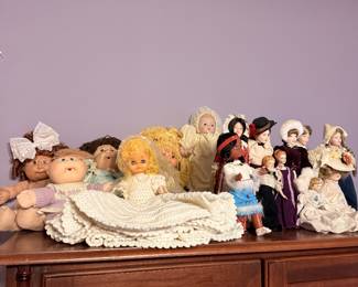 doll collection: early 1980's cabbage patch dolls and porcelain collectibles
