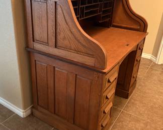SIDE VIEW OF ANTIQUE ROLL TOP DESK-ITEM OFFERED OFF SITE