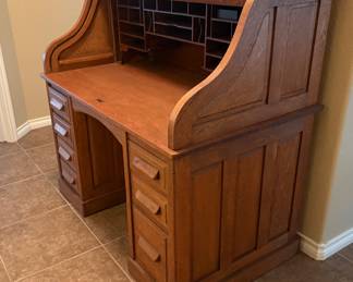 OTHER SIDE VIEW OF ANTIQUE ROLL TOP DESK-ITEM OFFERED OFF SITE