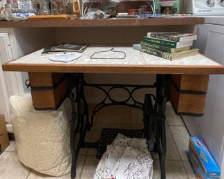 TABLE MADE FROM SEWING MACHINE BASE, BOOKS