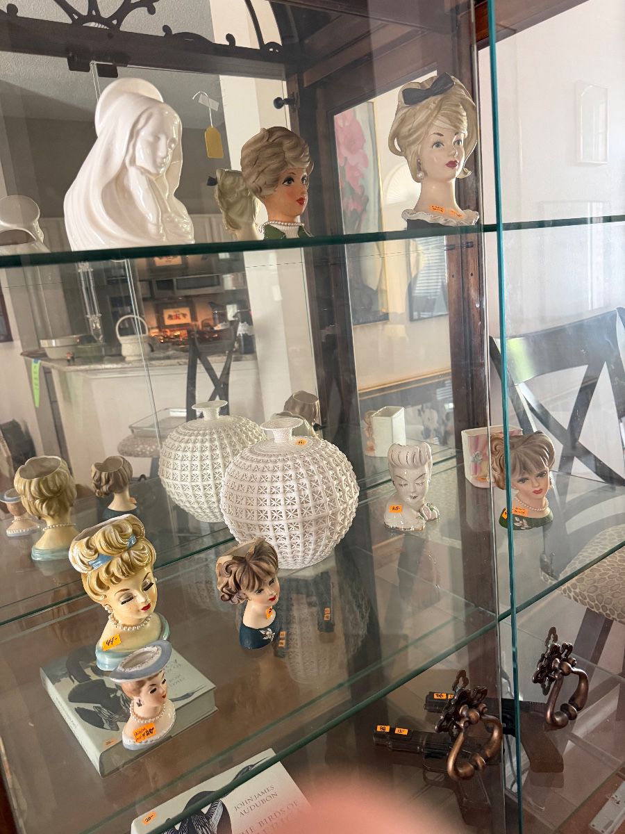 We still have a couple lady head vases 