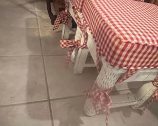 White Wicker Bench with Red Gingham Cushions