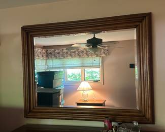Wood framed wall mirror