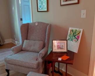 Beautiful custom fabric wingbacl chair and stool.