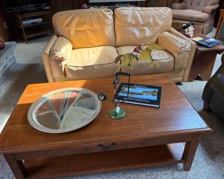Leather loveseat and Ethan Allen coffee table with signed  pottery plate 