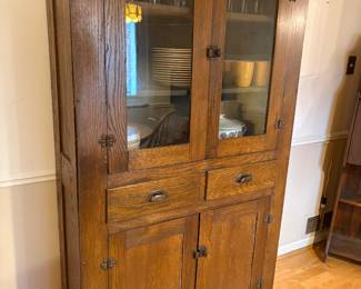 Another view of the primitive kitchen cabinets with glass front 