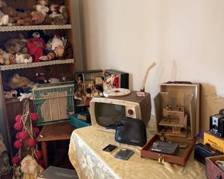 Vintage galore continues with barbies, TVs, sewing machine, cameras-- you name it!