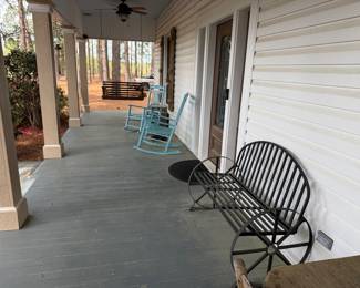 Rocking chairs and wagon wheel bench 