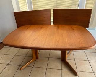 gutme Danish dining table includes 2 leaves (chairs not pictured)