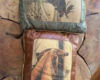 All leather "adventure-themed" pillows with moose and mountain man