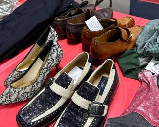 Some old shoes one pair of guys is alligator leather